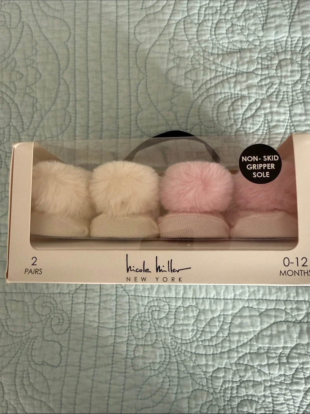 Nicole Miller Baby Pom Pom Booties in Cream and Light Pink